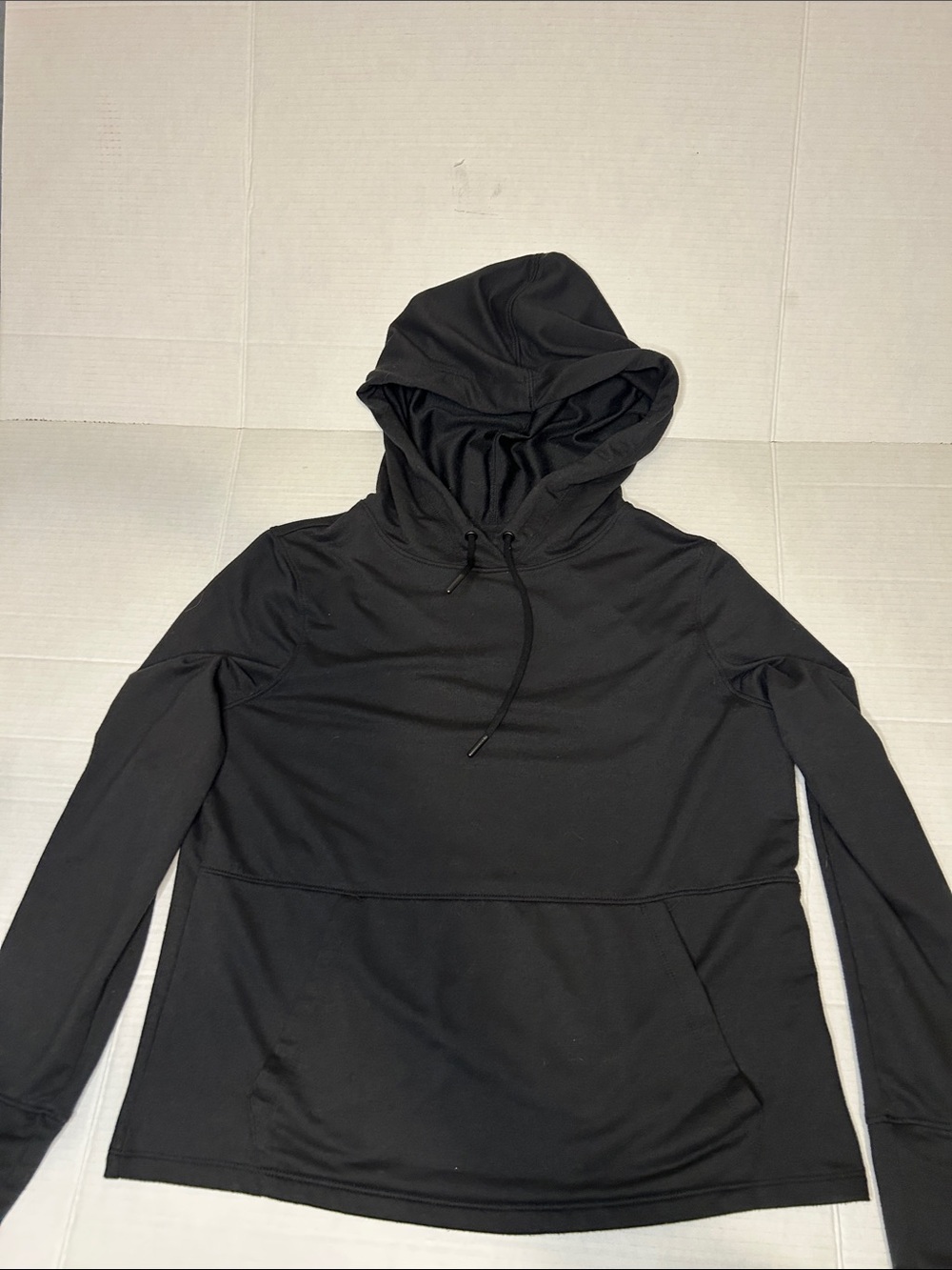 Avia Size Medium Black Lightweight Hoodie with crisscross back detail.